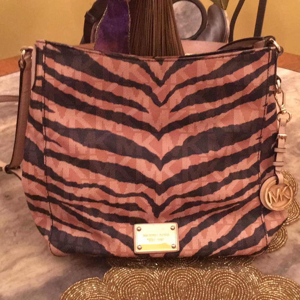 Michael Kors animal print crossbody bag.